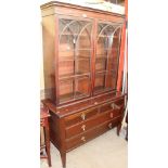 A mahogany bookcase top with astragal glazed doors together with an Edwardian mahogany chest of