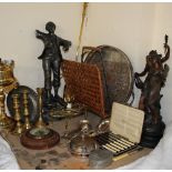 A pair of spelter figures together with brass candlesticks, brass wares, barometer, magazine rack,