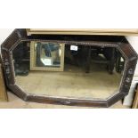 An oak framed wall mirror together with a large quantity of assorted decorative pictures and