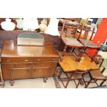 An oak mirror back sideboard together with an extending dining table and four chairs