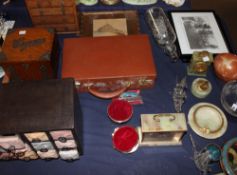 An oak and silver mounted cigar box together with a miniature chest of drawers, a leather case,
