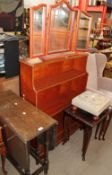 A 20th century oak gateleg dining table together with a dressing table mirror, waterfall bookcase,