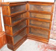 A Globe Wernicke mahogany eight section corner bookcase with glass up and over doors
