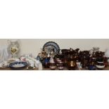 A collection of copper lustre jugs together with a floral encrusted twin handled vase, part tea set,