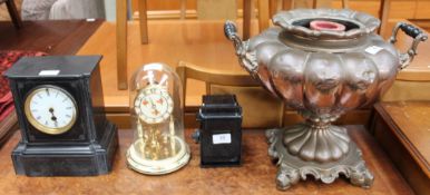 A black slate mantle clock together with an anniversary clock, a copper samovar,