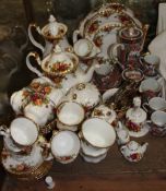 A Royal Albert Old Country Roses pattern part tea and coffee service together with a Japanese part