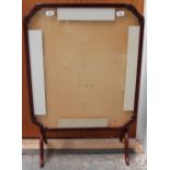 A mahogany framed folding table / fire screen