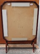 A mahogany framed folding table / fire screen