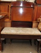 An Edwardian mahogany bureau with a drop flap, encasing pigeon holes,