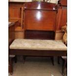 An Edwardian mahogany bureau with a drop flap, encasing pigeon holes,