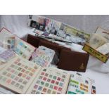 A stamp album containing a Penny Black, Penny reds etc together with stock books,