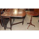 A 20th century oak gate leg dining table together with a wine table