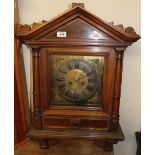 An Edwardian walnut wall clock,