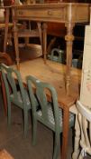 A pine kitchen table together with four painted kitchen chairs and a painted pine side table