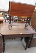 A late 19th century oak centre table with a rectangular top, on four reeded legs,