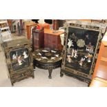 A Japanese black lacquer hardstone inset side cabinet together with a similar cupboard and coffee