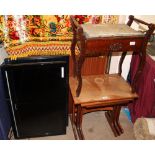 A piano stool together with a teak nest of three tables and two television monitors