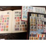 Seven assorted stamp albums containing world stamps and a loose stamp album