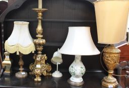 A large gilt table lamp together with five other lamps