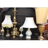 A large gilt table lamp together with five other lamps