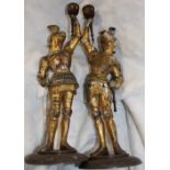 A pair of spelter candlesticks,