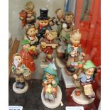 A collection of Hummel figures