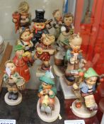 A collection of Hummel figures