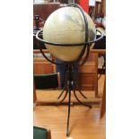 A 30cm globe mounted in a metal stand on tripod base