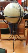 A 30cm globe mounted in a metal stand on tripod base