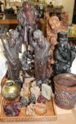 A carved bamboo brush pot together with hardwood carved Chinese figures, carved soapstone,