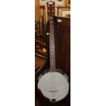 A five string banjo with a rosewood back and neck