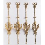 FOUR WALL APPLIQUES WITH LYRES 1820; Paris, France 147 cm Gilt bronze. Four Louis XVI style wall