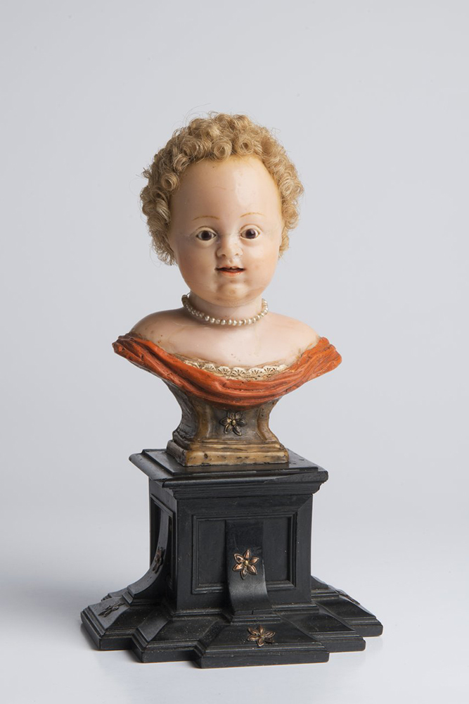 BUST OF A GIRL First half of 18th century 23 cm Wax, hair, wood, glass, pearls, metal. This Late