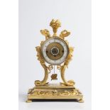 AN EMPIRE TABLE CLOCK 1825; Austria-Hungary, Vienna 39x17x11 cm Gilt bronze. The fire-gilded