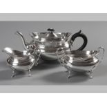 A GEORGE V THREE PIECE SILVER TEA SET, SHEFFIELD 1933, R.S., comprising a teapot, creamer and