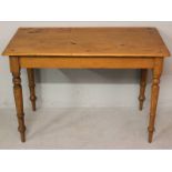 A LATE 19TH CENTURY CAPE OREGON RECTANGULAR TABLE, the moulded top above a plain frieze and standing