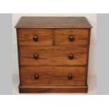 A VICTORIAN MAHOGANY CHEST OF DRAWERS, the rectangular moulded top above two short and two long