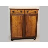 A 19TH CENTURY CAPE STINKWOOD AND YELLOWWOOD JONKMANSKAS, the single plank yellowwood top with an