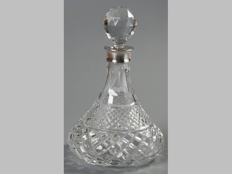 A 20TH CENTURY SILVER MOUNTED AND CUTGLASS DECANTER, BIRMINGHAM 1992, C.J.V., with removable