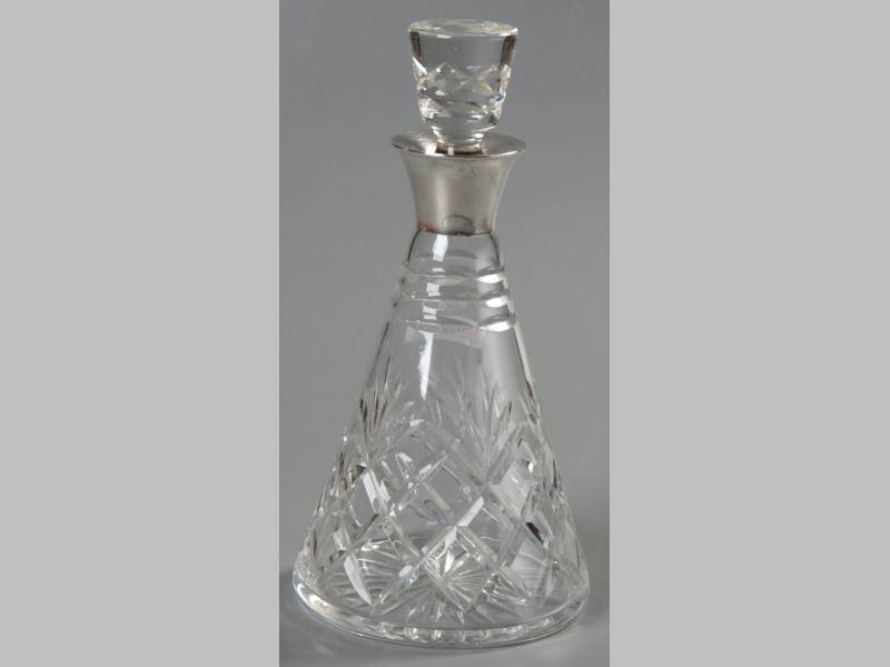 A GEORGE VI SILVER MOUNTED AND CUTGLASS DECANTER, LONDON 1937, MAKERS MARKS INDECIPHERABLE, with