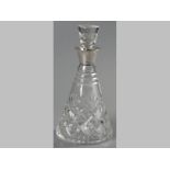 A GEORGE VI SILVER MOUNTED AND CUTGLASS DECANTER, LONDON 1937, MAKERS MARKS INDECIPHERABLE, with