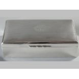 A GEORGE VI SILVER CIGARETTE BOX, BIRMINGHAM 1946, MAKERS MARKS INDECIPHERABLE, of rectangular form,