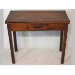 A GEORGE III MAHOGANY TEA TABLE, the folding rectangular top above a single drawer set in a cock-