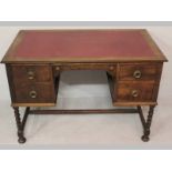 A 1930'S BELLWEBB WRITING DESK, the retangular to inset with a writing surface above four short