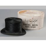 AN EARLY 20TH CENTURY TOP HAT, BY DAVIES BROS., ADDERLEY STREET, CAPE TOWN, dated 1938, complete