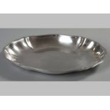 AN .835 STD CONTINENTAL SILVER OVAL BOWL, with serpentine rim, plain well, the base engraved "20.