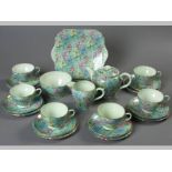 A SHELLEY "MELODY" CHINTZ PATTERN TEA SET, Circa 1930's, comprising a teapot, sugar basin,