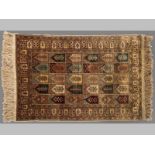 A MODERN SILK GARDEN PATTERN KAYZERIE RUG, 119 by 80cm.