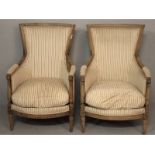 A PAIR OF LATE 19TH CENTURY FRENCH-STYLE ARMCHAIRS, the backs, cushions and armrests upholstered,