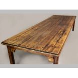 A 19TH CENTURY PINE FARMHOUSE TABLE, the well patinated top above a moulded edge and plain frieze,